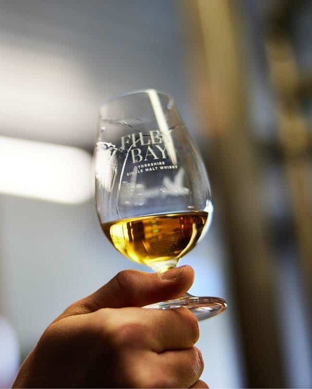 Filey Bay whisky in a nosing glass