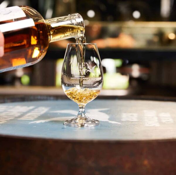 Filey Bay Whisky poured into a glass in the still house