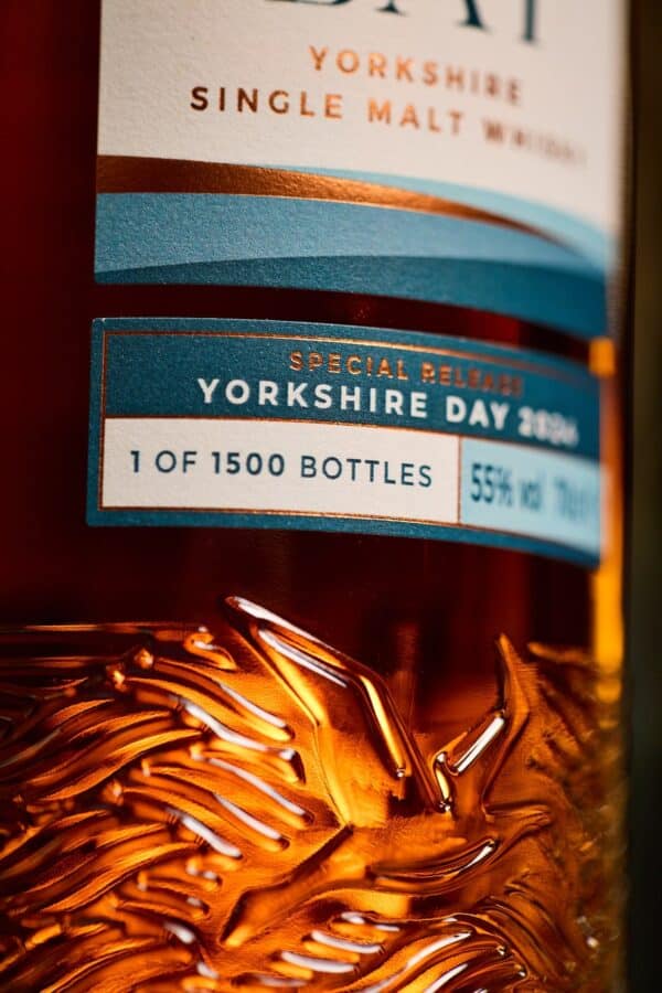 A close up of the gannet embossed in the glass of the Filey Bay Yorkshire Day bottle
